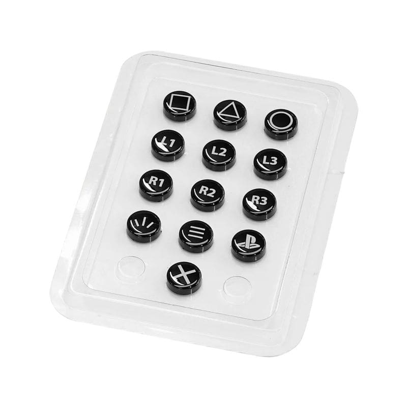 De Fanatec ClubSport PlayStation Button Caps set heeft twaalf zwarte, ronde doppen in een tray, elk voorzien van PlayStation symbolen en labels zoals R1, R2, L1, L2, L3 en R3.